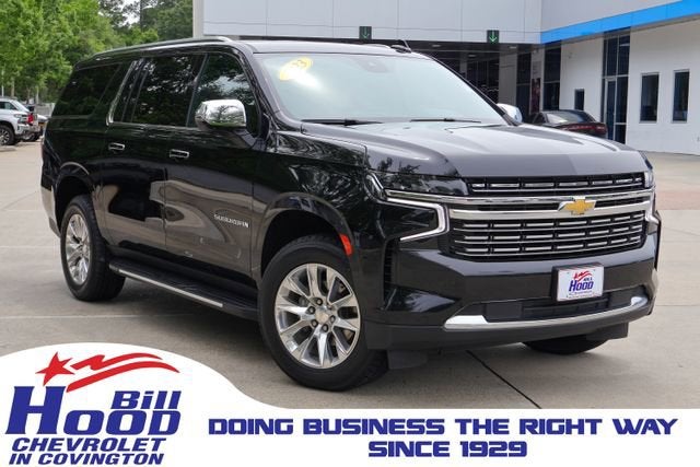 2023 Chevrolet Suburban Premier in Black — front three-quarter view