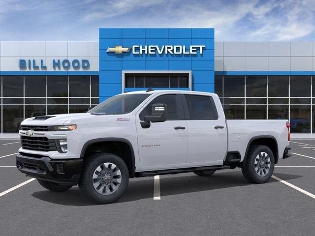 2026 Chevrolet Silverado 2500 HD Custom in Summit White — front three-quarter view