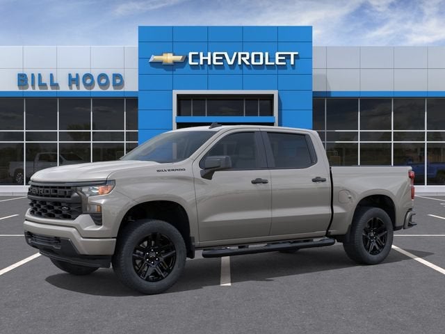 2026 Chevrolet Silverado 1500 Custom in White Sands — front three-quarter view