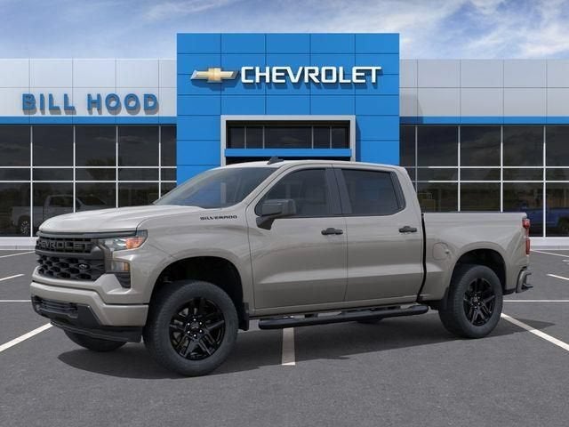 2026 Chevrolet Silverado 1500 Custom in White Sands — front three-quarter view